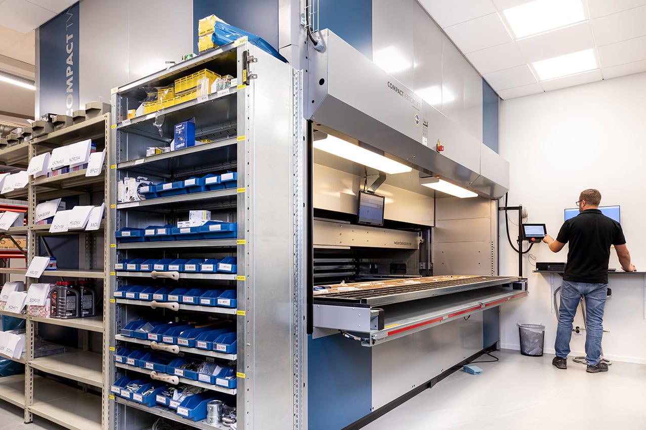 vertical lift module with operator