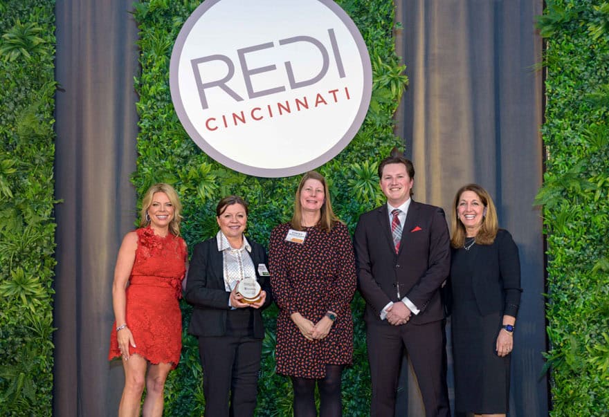 REDI Cincinnati award to SencorpWhite with Bridget Burkhardt
